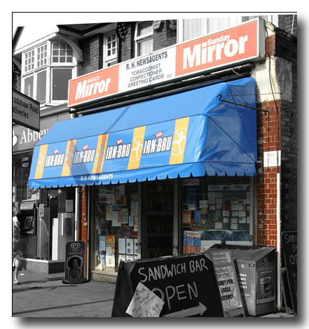 Example of typical shop canopy with illuminated box sign